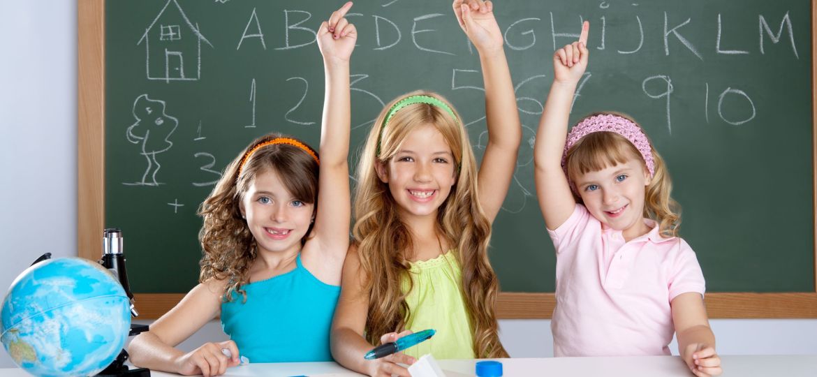 Clever kids student group at school classroom